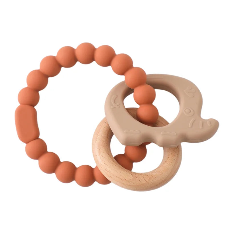 gant-de-dentition-silicone-bebe-bracelet-orange-creme